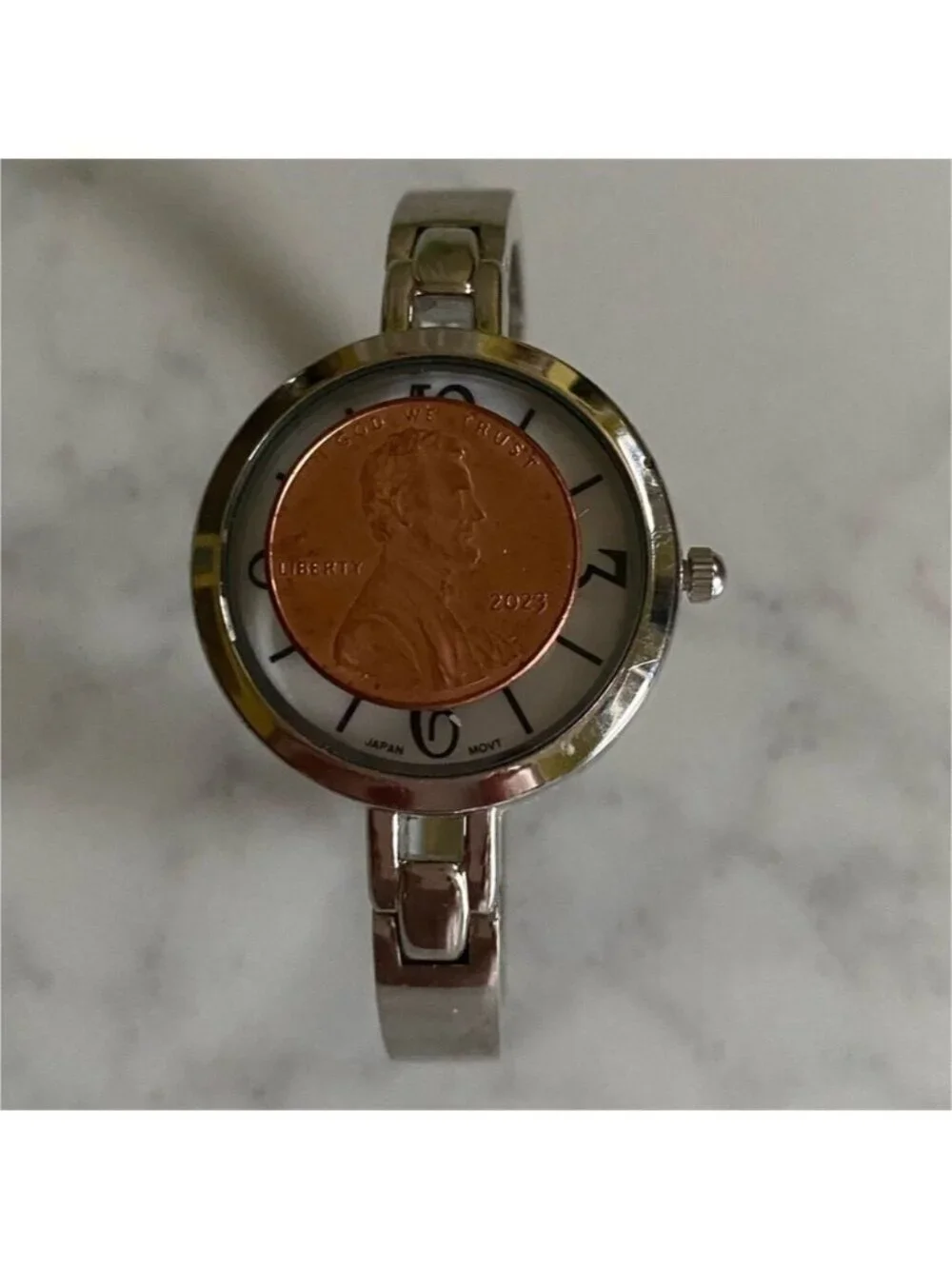 Avon silver tone